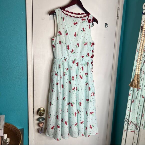 Unique Vintage Dresses & Skirts - Unique vintage cherry print button down on side beautiful new no tags